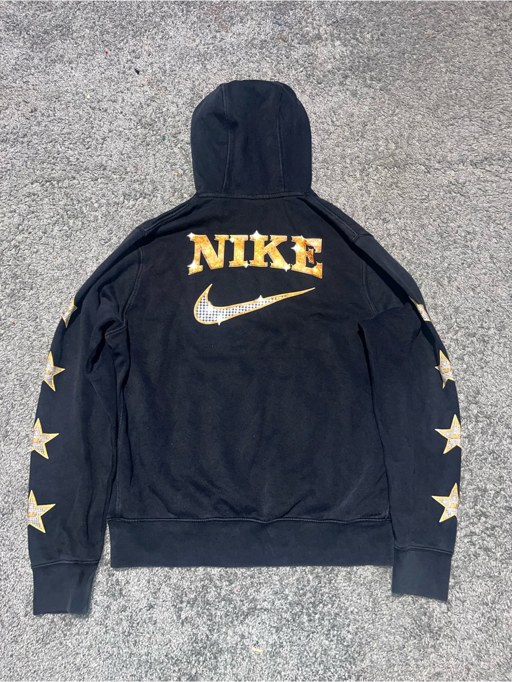 Nike Black Hoodie with Gold Star Sleeve Accents